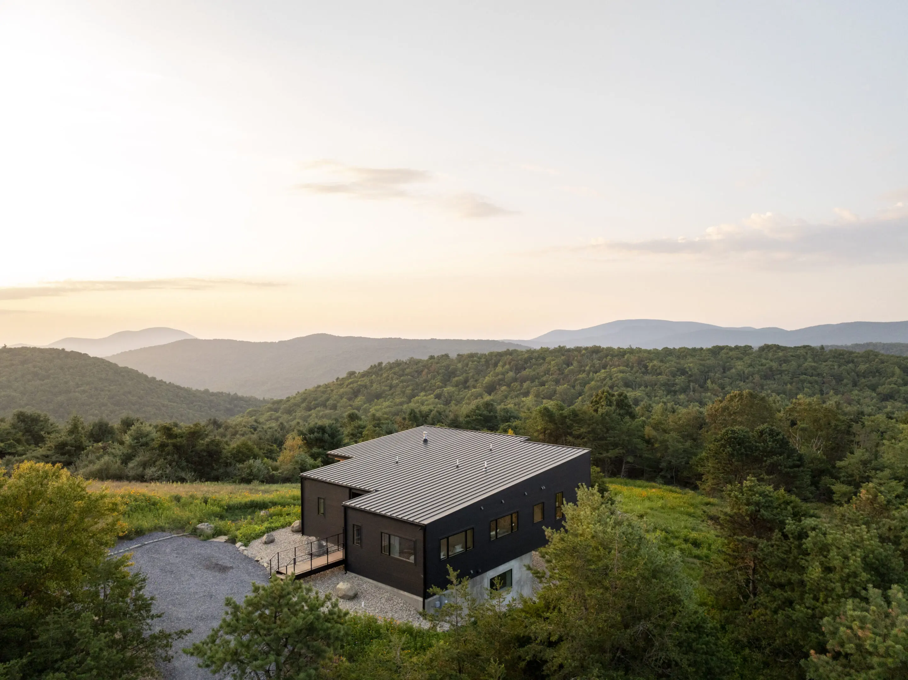 A house with a large open area in the middle of it.
