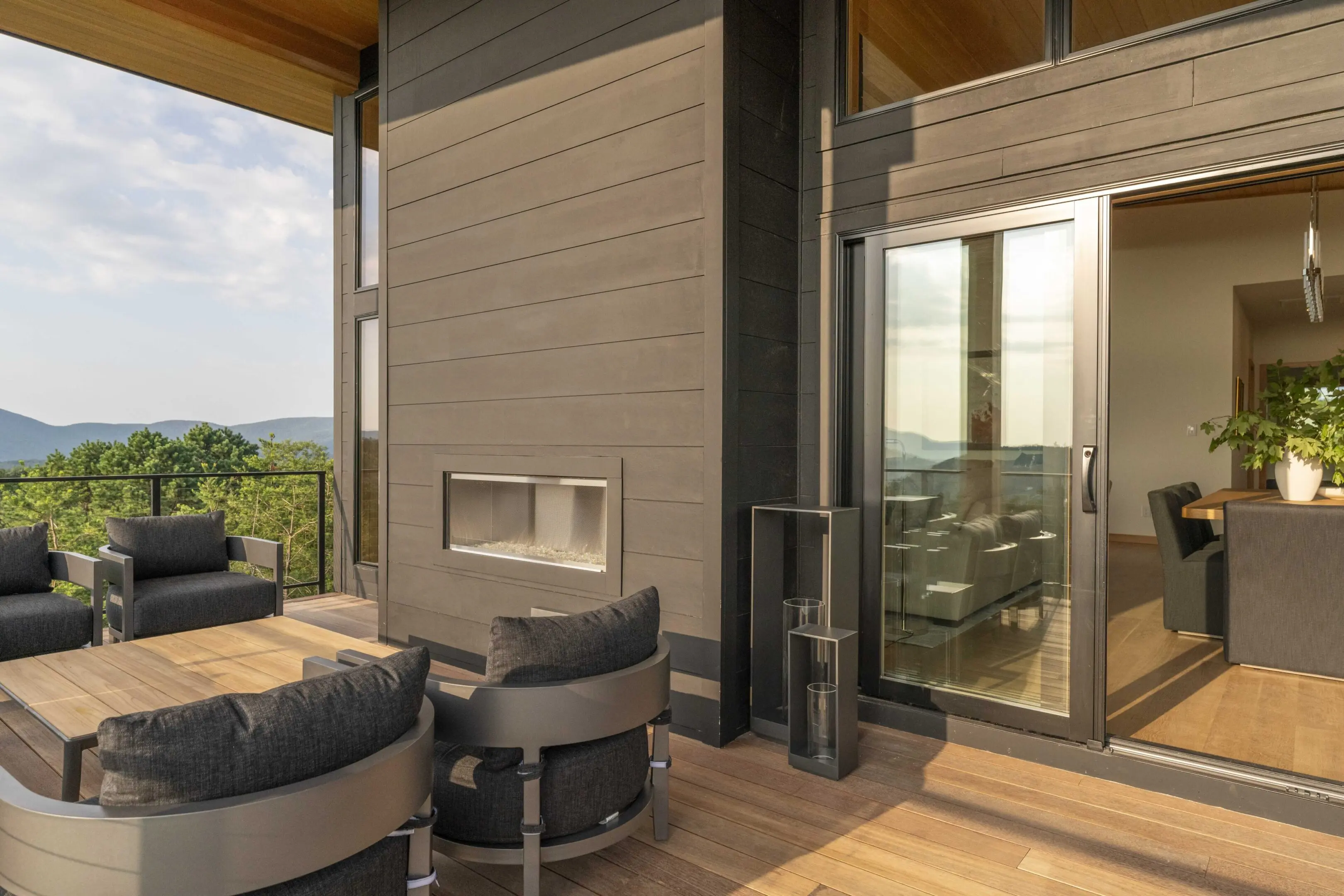 A room with a fireplace and a balcony
