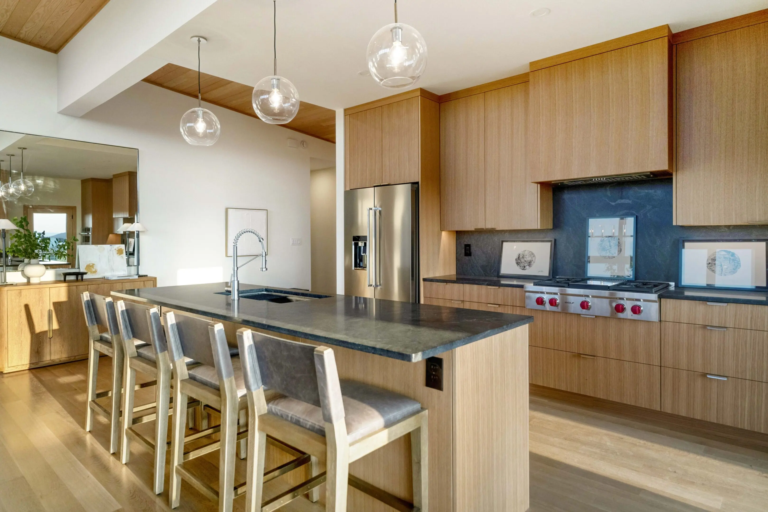 A kitchen with wooden cabinets and stainless steel appliances.