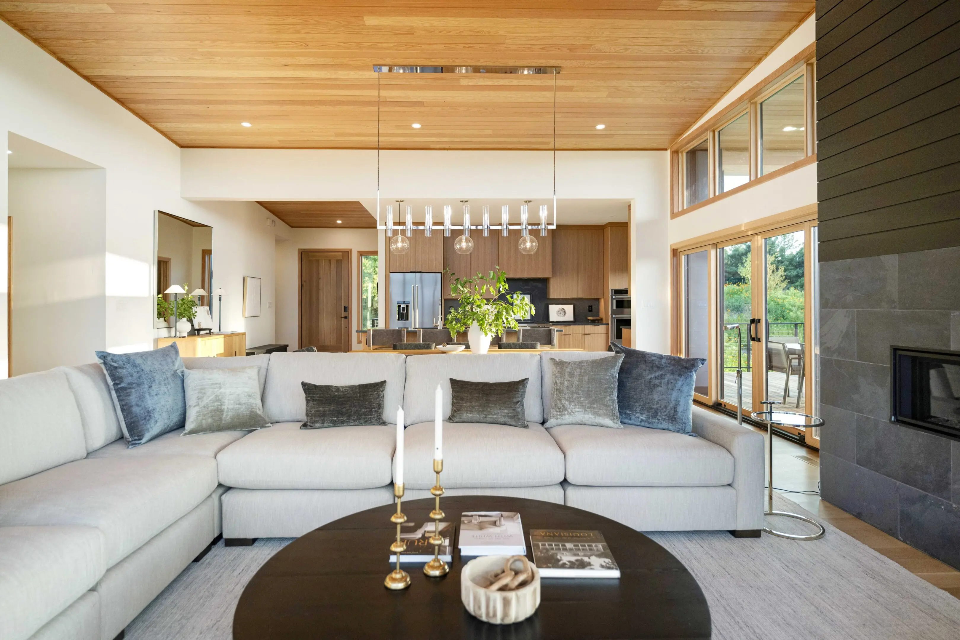 A living room with couches and tables in it
