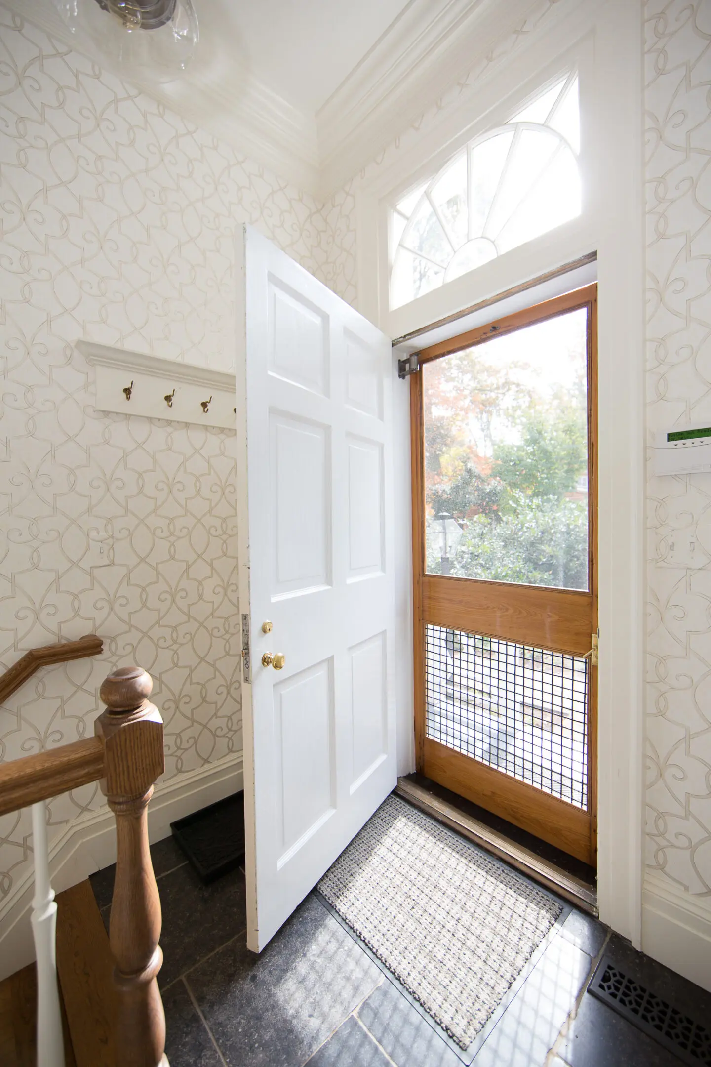 A door open to the inside of a house.
