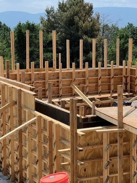 New Project (2) A wooden structure being built with wood in it.